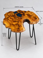 AI-styled view of Zitun Atelier table 008, an olive wood resin side table with dark teal resin burl, on a light background with measurement annotations.