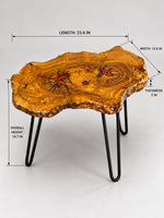 AI-styled view of Zitun Atelier table 011, an olive wood resin side table with red resin accents, on a light background with measurement annotations.