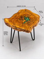 AI-styled view of Zitun Atelier table 012, an olive wood resin side table with emerald green star resin, on a light background with measurement annotations.