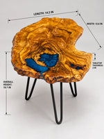 AI-styled view of Zitun Atelier table 022, an olive wood resin side table with blue resin inlay, on a light background with measurement annotations.