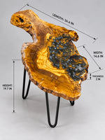 AI-styled view of Zitun Atelier table 037, an olive wood resin side table with blue pebble resin, on a light background with measurement annotations.