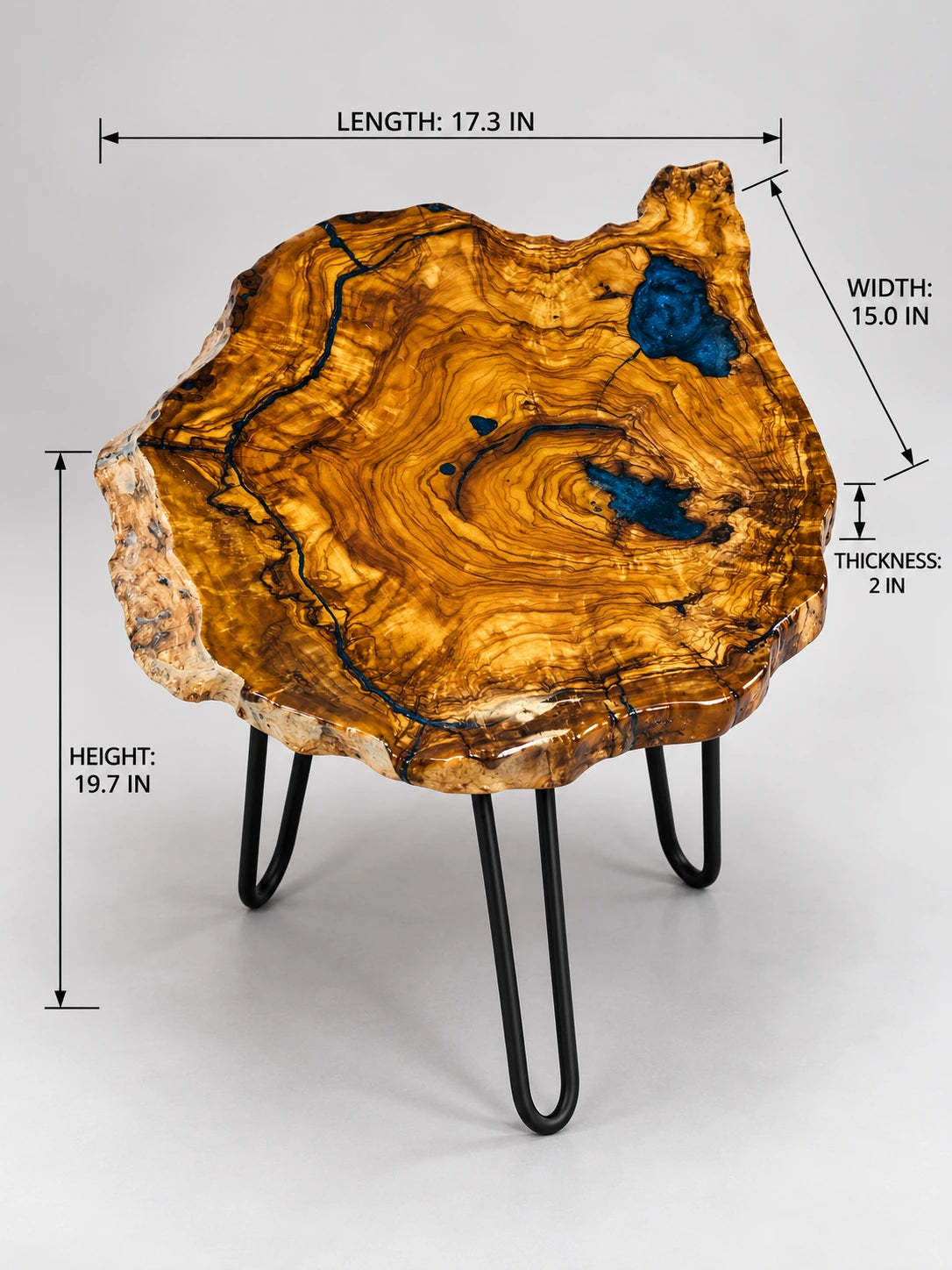 AI-styled view of Zitun Atelier table 038, an olive wood resin side table with blue resin accents, on a light background with measurement annotations.