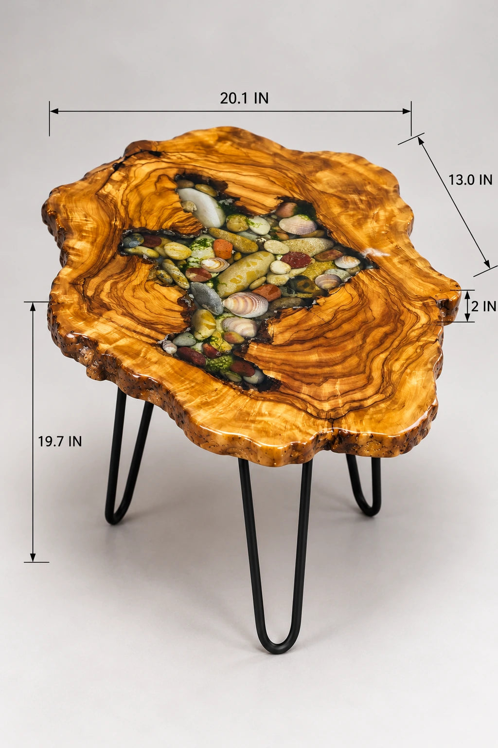 AI-styled view of Zitun Atelier table 047, an olive wood resin side table with sea shell pebble resin, on a light background with measurement annotations.