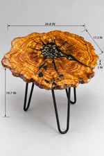 AI-styled view of Zitun Atelier table 055, an olive wood resin small coffee table with black resin clock gears, on a light background with measurement annotations.