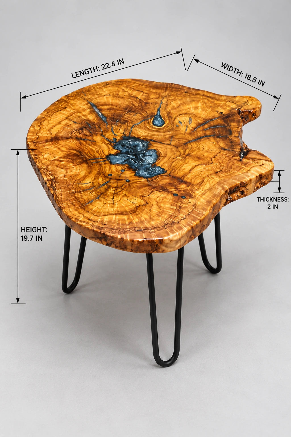 AI-styled view of Zitun Atelier table 064, an olive wood resin side table with metallic blue resin, on a light background with measurement annotations.