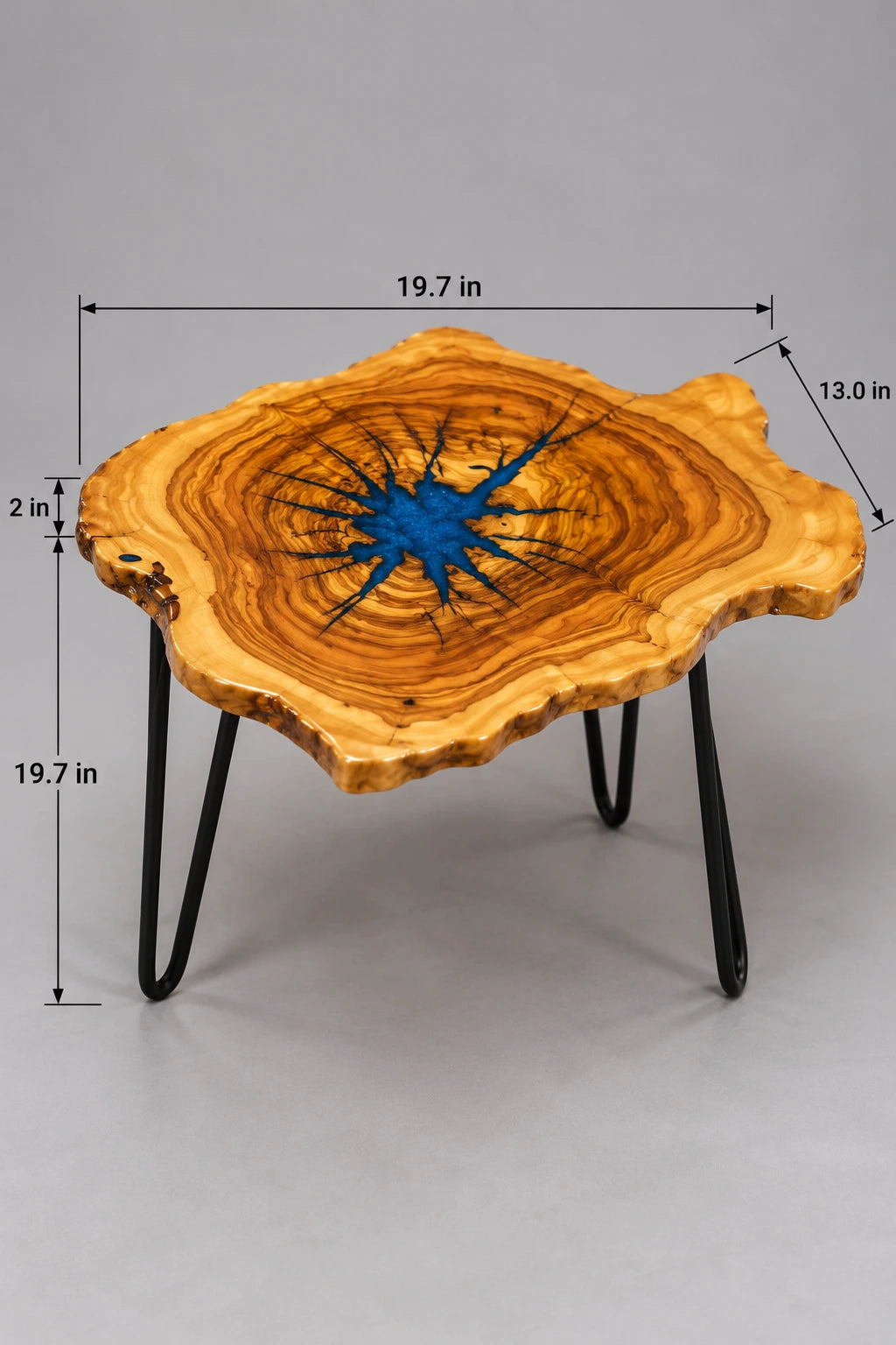 AI-styled view of Zitun Atelier table 079, an olive wood resin side table with blue starburst resin, on a light background with measurement annotations.