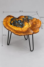 AI-styled view of Zitun Atelier table 092, an olive wood resin side table with black pebble resin, on a light background with measurement annotations.